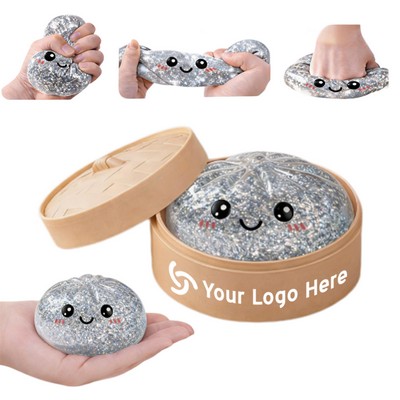 Sparkling golden pink bun shaped pressure toy